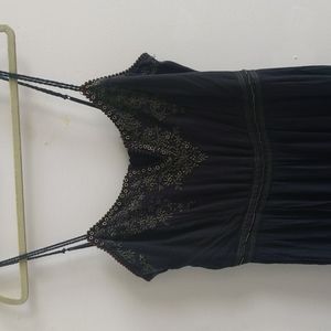 Free People jumpsuit with embroidered trim